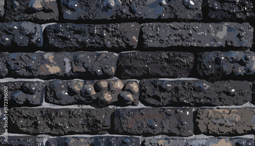 A close-up view of a dark gray brick wall with rough texture