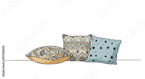Two patterned decorative throw pillows with blue and beige designs on white