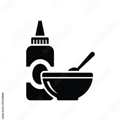 A simple black silhouette depicts a bottle bowl and spoon suggesting hair dye or food preparation