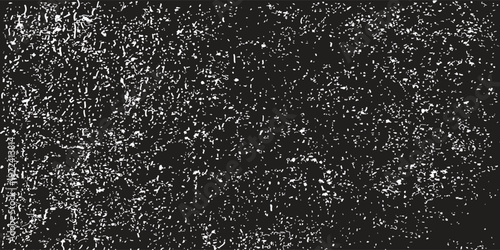 An elegant black and white vector background featuring high quality distressed noise texture with artistic white grain and stipple effects for premium vintage or urban industrial designs.