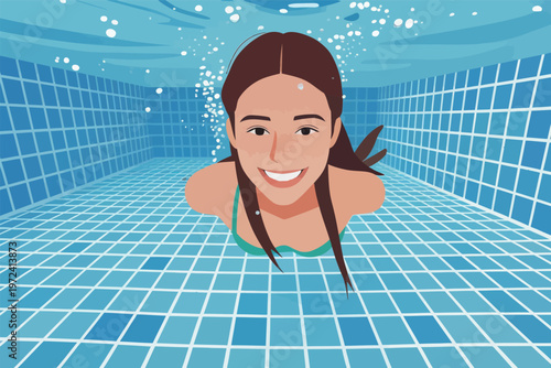 Woman swims underwater in a swimming pool with blue tiles during daylight hours