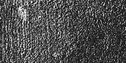 A high quality black and white vector background featuring an elegant distressed grain texture with artistic white noise and stipple effects for professional vintage or industrial designs.