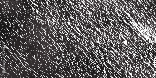 A high quality black and white vector background featuring an elegant distressed grain texture with artistic white noise and stipple effects for professional vintage or industrial designs.