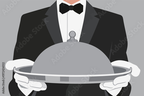 Waiter serves a covered dish in a formal setting in a restaurant during dinner time