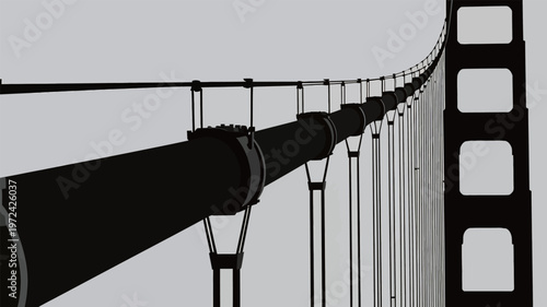Bridge cables stretch high against gray sky with strong lines and detailed structure in view