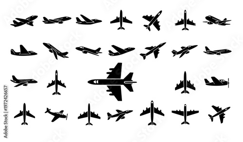 A collection of airplane silhouettes in various flight positions and styles