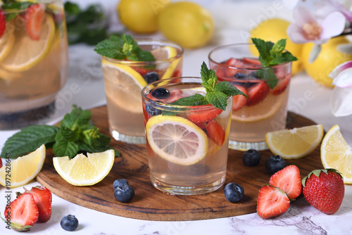 Lemonade with strawberries, blueberries and mint. Perfect for a hot summer day