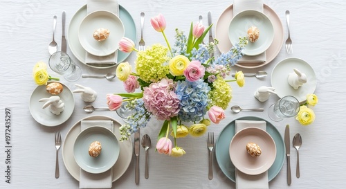 Elegant easter table setting with pastel plates, flowers, and decorative eggs, pastel colors, floral arrangement, family gathering, fine dining, home decor, interior design, flat lay, white background