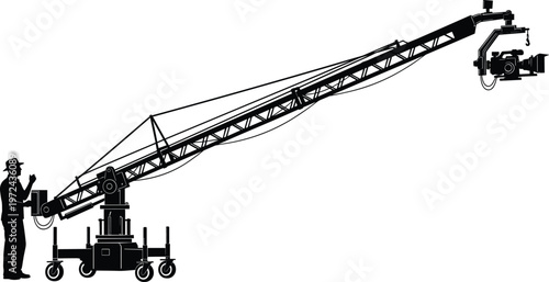 Silhouette of professional cameraman operating large camera crane jib on film set for cinema production television broadcasting and movie making industry