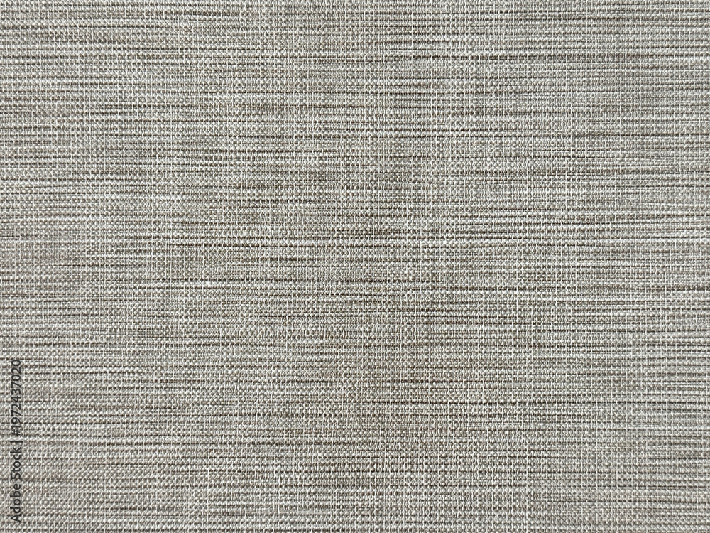 Fototapeta premium Close up of monochrome grey linen and nylon fabric. Suitable for upholstery, pillow cover, wallpaper, and graphic background. Seamless background texture