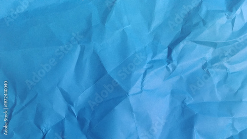 Blue texture kraft paper, recycled cardstock. Old crumpled recycled paper close-up of old crumpled recycled paper