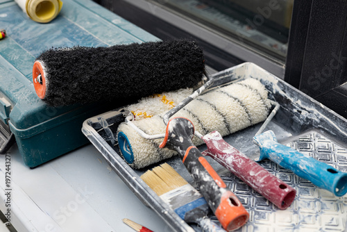 Konstfotografi House renovation dirty painting tools laying in plastic container