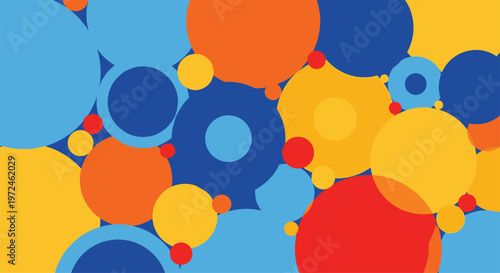Seamless abstract pattern of brightly colored, overlapping circles and rings in blue, orange, yellow, and red, creating a playful and dynamic design.