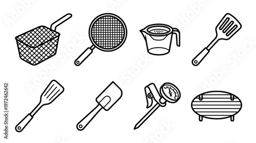 Collection of kitchen utensils and tools for cooking and food preparation