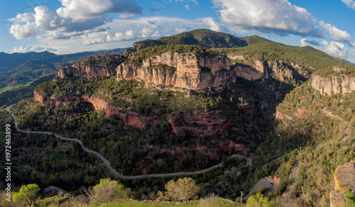 Aerial panoramic view of the Cliffs of Arbolí from Siurana old town, Cornudella municipality, Priorat region, province of Tarragona, Catalonia, Spain