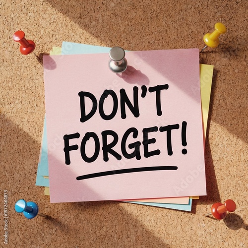 Don't forget sticky note on cork board, reminder message, office organization concept