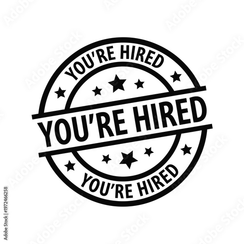 A circular black and white stamp announces you re hired with stars and bold lettering signifying job acceptance high quality