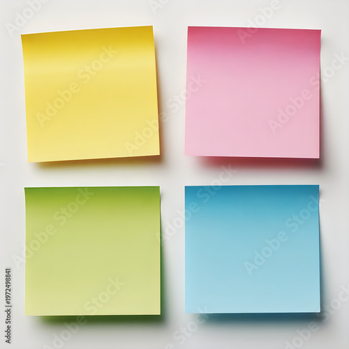 A stack of colorful sticky notes on a gray background