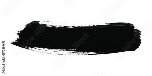 Thick horizontal black paint brush stroke with visible bristle texture and dry edges isolated on a white background