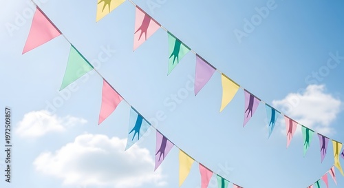 Colorful Triangular Flag Banners Flapping in Clear Sky