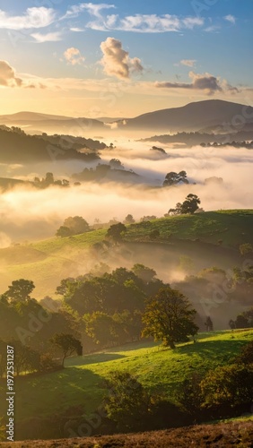 Serene Morning Mist Over Rolling Hills and Landscape at Sunrise