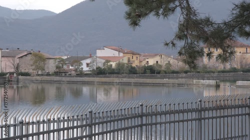 Water reservoir in the historic village of Rocchetta a Volturno, Molise, Italy, with mountain background.
