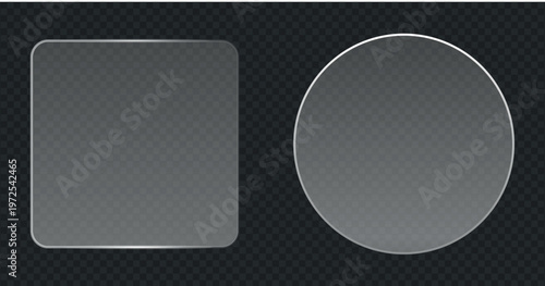 Variety of clear glass plates with rounded edges and rivets on dark background.