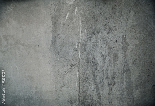 Old grunge concrete wall with splashes of lime.