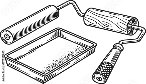 A black steel kitchen grater and a paint brush tool are isolated together as equipment for business and technology