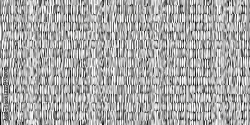 Abstract black and white texture resembling woven straw or reeds