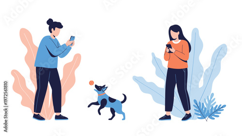 Two young women in a park using their smartphones while one takes a picture of a playful dog jumping for a small ball.