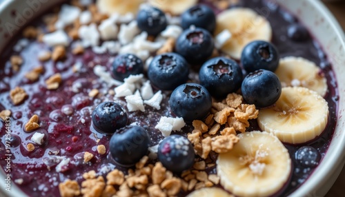 Delicious Acai Smoothie Bowl Topped with Fresh Blueberries Bananas Granola and Coconut Flakes