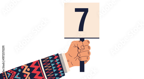 Person wearing a colorful patterned sweater holds up a white square sign with the number seven, useful for ratings, countdowns, or identification purposes.