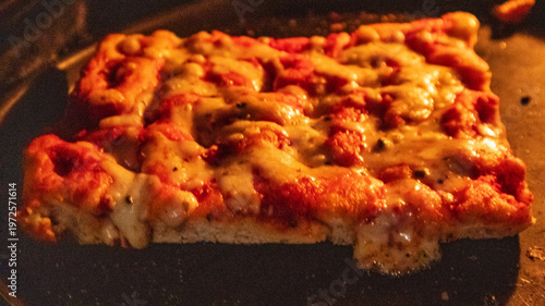 Delicious Square Deep Dish Pizza Slice with Melted Cheese