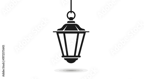 Black hanging outdoor lantern light fixture.