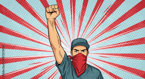 Focused man wearing a red bandana mask raising a clenched fist in protest against a background of red and white radial stripes.