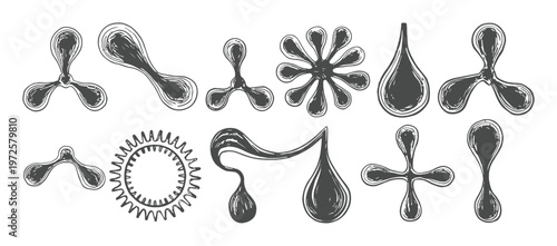 Collection of Abstract Organic Shapes and Splatters in Dark Gray