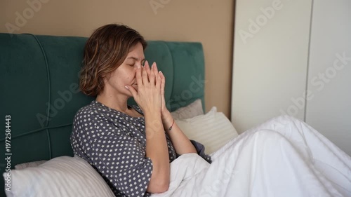 Blonde Mature Woman with Headache Feeling Exhausted and Burned Out in Bedroom
