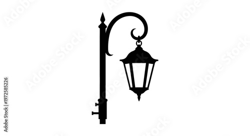 Black street lamp post with lantern.