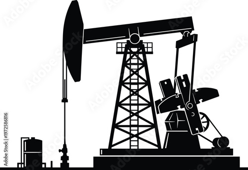Black silhouette of an oil pump jack on a, used for extracting crude oil