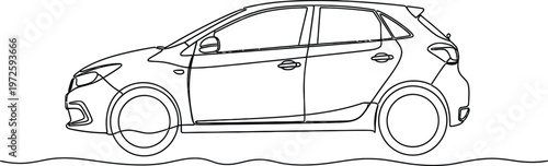 A classic car with a sleek design and large, shiny hubcaps on display