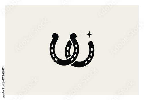 Two Interlocking Horseshoes with a Sparkle Symbol