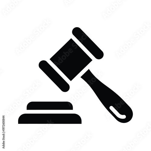 A judicial gavel resting on a wooden block symbolizing authority and law