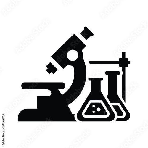 Classic laboratory tools including microscope and flasks for scientific research