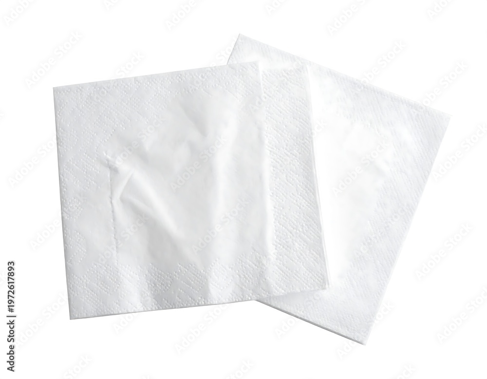 Obraz premium Two simple white, square paper napkins, slightly overlapping on a white background