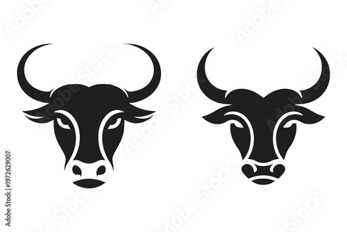 Two stylized black bull heads are presented in profile showcasing strong horns and facial features high-quality professional detailed modern elegant