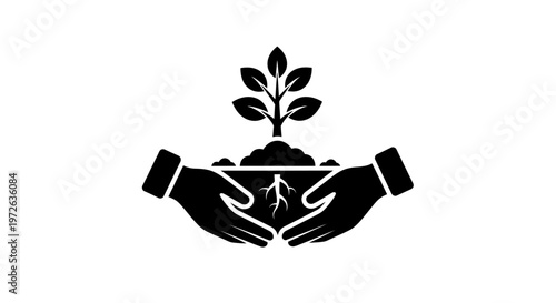 Hands cradling earth with growing plant.