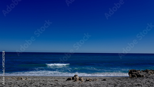 The coral rocky coast off Jupiter Island Beach in Florida