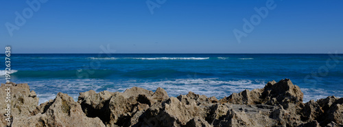 The coral rocky coast off Jupiter Island Beach in Florida