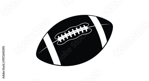 A striking black and white depiction of an american football showcasing its iconic shape and design silhouette